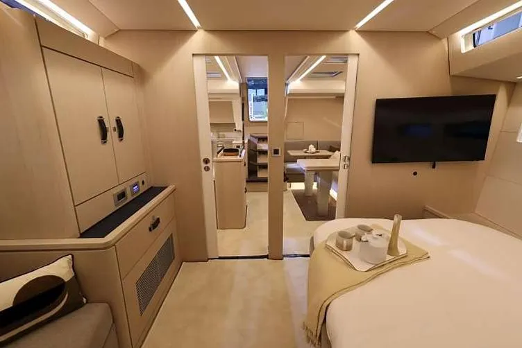 Slide: The Image of Luxurious interior of 2024 Jeanneau 55 yacht with modern furnishings and elegant design. - 12