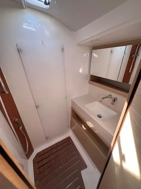 Slide: The Image of Modern bathroom in 2024 Dufour 470 yacht with sleek sink and shower. - 10