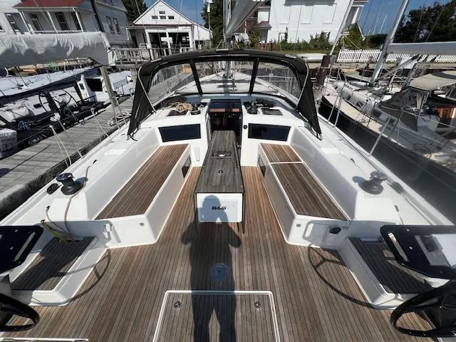 Slide: The Image of 2024 Dufour 470 yacht cockpit with teak decking and modern design. - 2