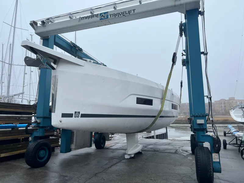 Slide: The Image of 2024 Dufour 470 sailboat in a boatyard lift. - 5