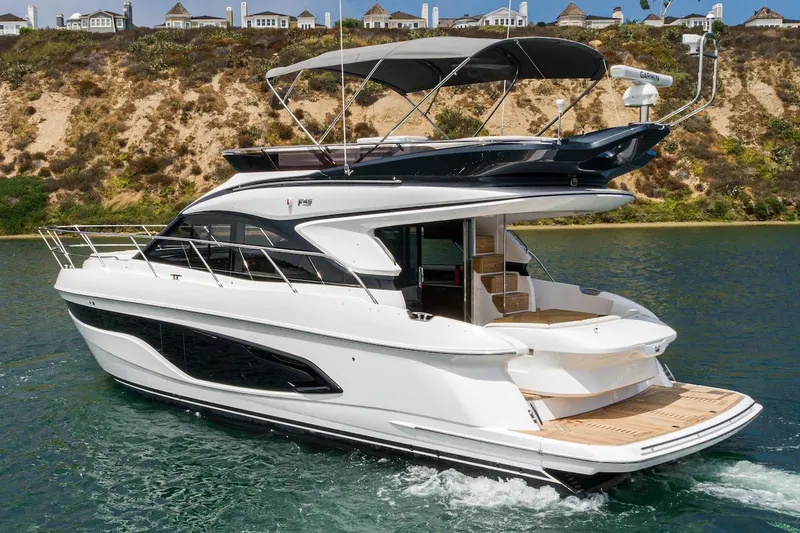 Slide: The Image of 2024 Princess F45 yacht cruising on water with scenic background. - 7