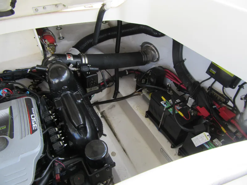 Slide: The Image of Engine compartment of a 2011 Sea Ray 250 SLX boat, featuring a 350 MAG engine. - 10