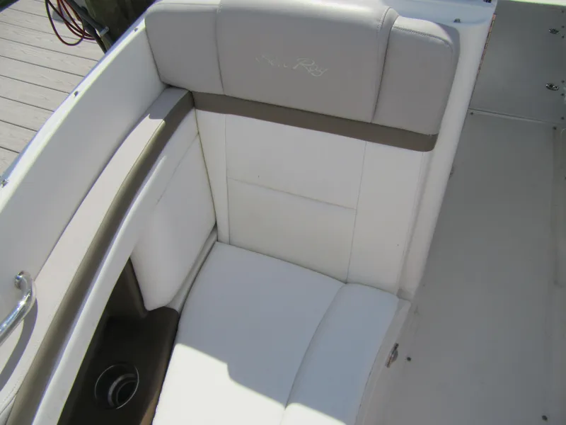 Slide: The Image of 2011 Sea Ray 250 SLX boat seat with white and gray upholstery. - 18