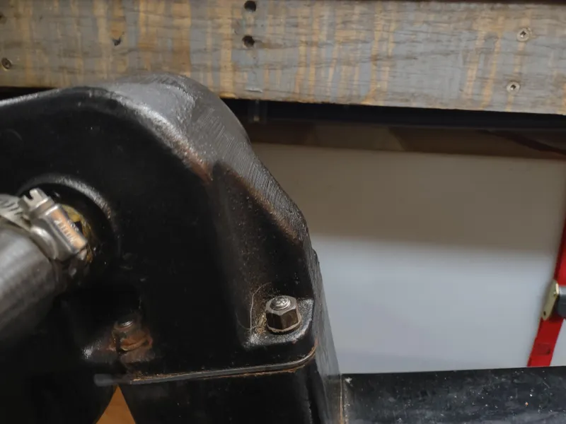 Slide: The Image of Close-up of a mechanical component on a 1976 Trojan 260 Hardtop Express boat. - 11