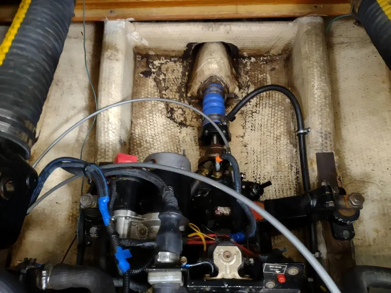 Slide: The Image of Engine compartment of a 1976 Trojan 260 Hardtop Express boat. - 9