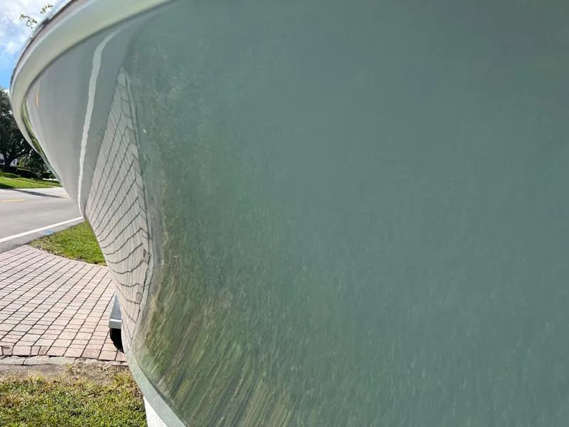 Slide: The Image of Close-up of 1987 Intrepid 300 Center Console boat hull. - 21