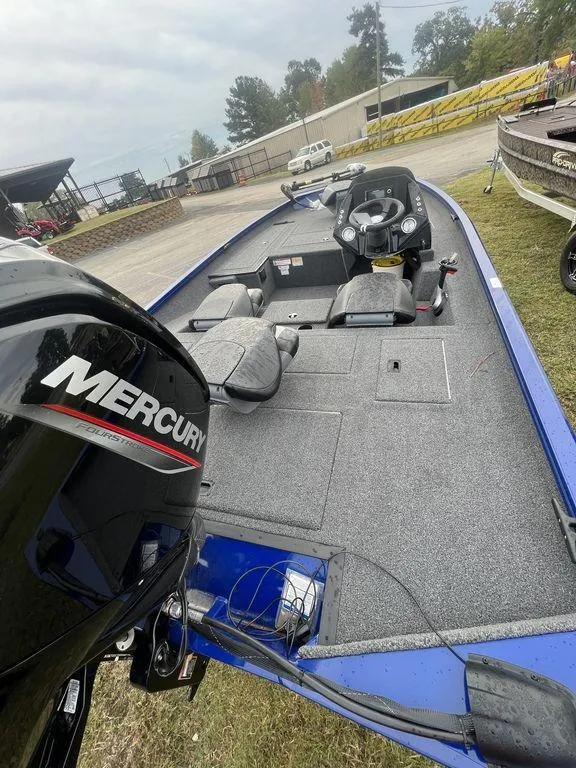 Slide: The Image of 2023 Crestliner XF 179 boat with Mercury engine, interior view. - 4