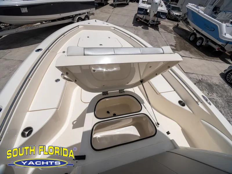Slide: The Image of 2023 ShearWater 260 Carolina boat with open storage compartments at South Florida Yachts. - 12