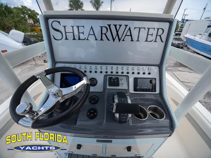 Slide: The Image of 2023 ShearWater 260 Carolina boat console at South Florida Yachts. - 14