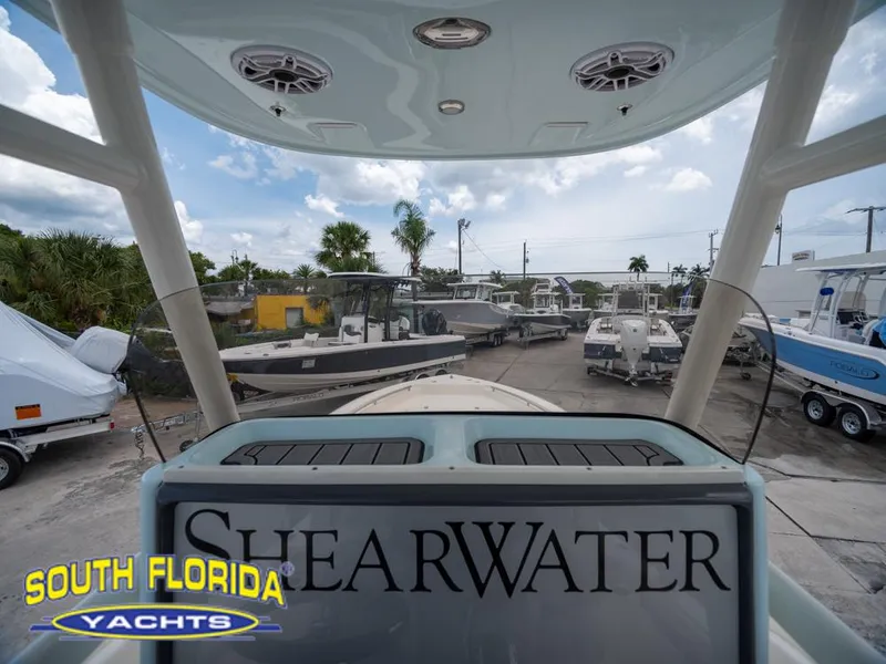 Slide: The Image of 2023 ShearWater 260 Carolina boat at South Florida Yachts dealership. - 15