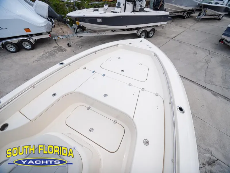 Slide: The Image of 2023 ShearWater 260 Carolina boat at South Florida Yachts dealership. - 18