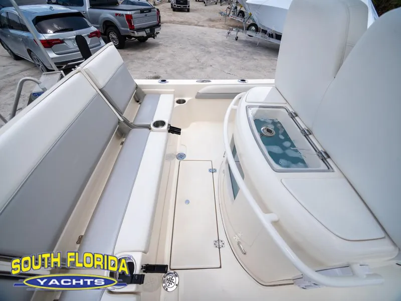 Slide: The Image of 2023 ShearWater 260 Carolina boat interior with seating and livewell, South Florida Yachts. - 19