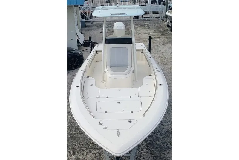 Slide: The Image of 2023 ShearWater 260 SS boat with sleek design and spacious deck. - 3