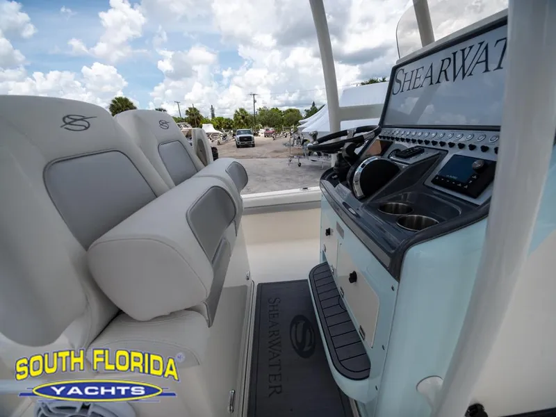 Slide: The Image of 2023 ShearWater 260 Carolina boat interior with South Florida Yachts branding. - 37