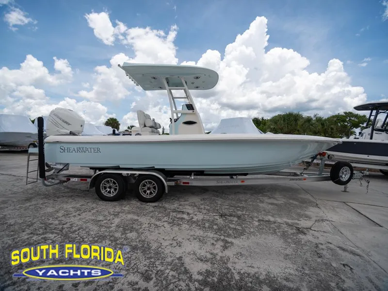 Slide: The Image of 2023 ShearWater 260 Carolina boat on trailer at South Florida Yachts dealership. - 4