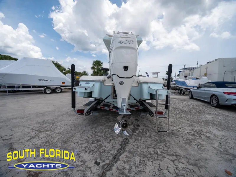 Slide: The Image of 2023 ShearWater 260 Carolina boat at South Florida Yachts dealership. - 7