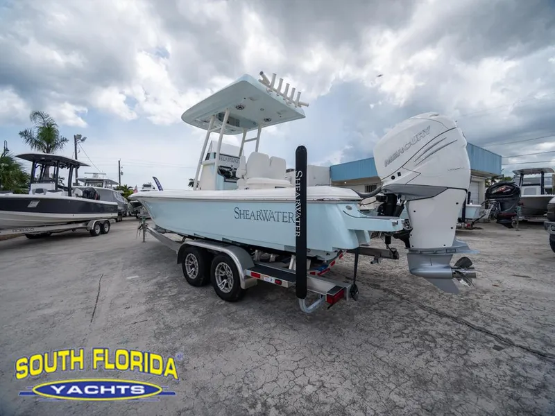 Slide: The Image of 2023 ShearWater 260 Carolina boat on trailer at South Florida Yachts dealership. - 8