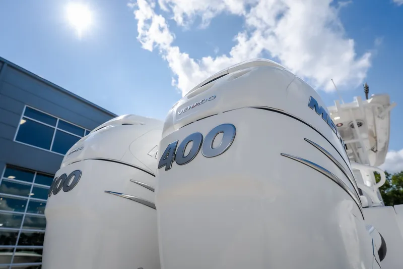 Slide: The Image of Twin Mercury 400 outboard engines on a 2023 Fountain 34 Tournament Edition boat. - 36