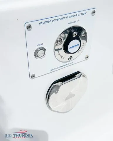 Slide: The Image of 2023 Fountain 34 TE Reverso outboard flushing system, Big Thunder Marine logo. - 4