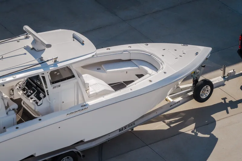 Slide: The Image of 2023 Fountain 34 Tournament Edition boat on trailer, aerial view. - 74
