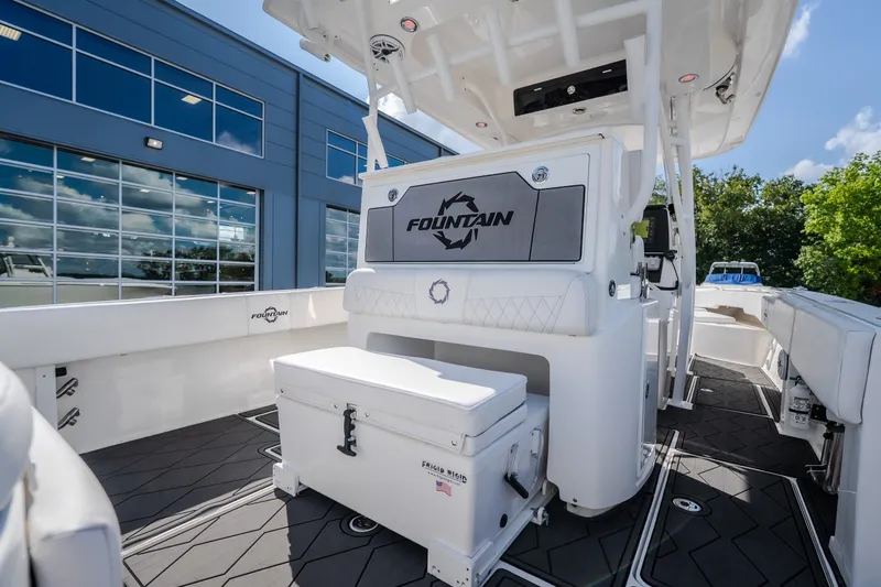 Slide: The Image of 2023 Fountain 34 Tournament Edition boat interior with seating and storage. - 41