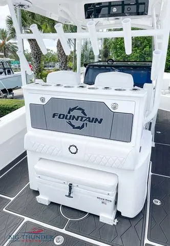 Slide: The Image of 2023 Fountain 34 TE boat interior with seating and storage. - 6