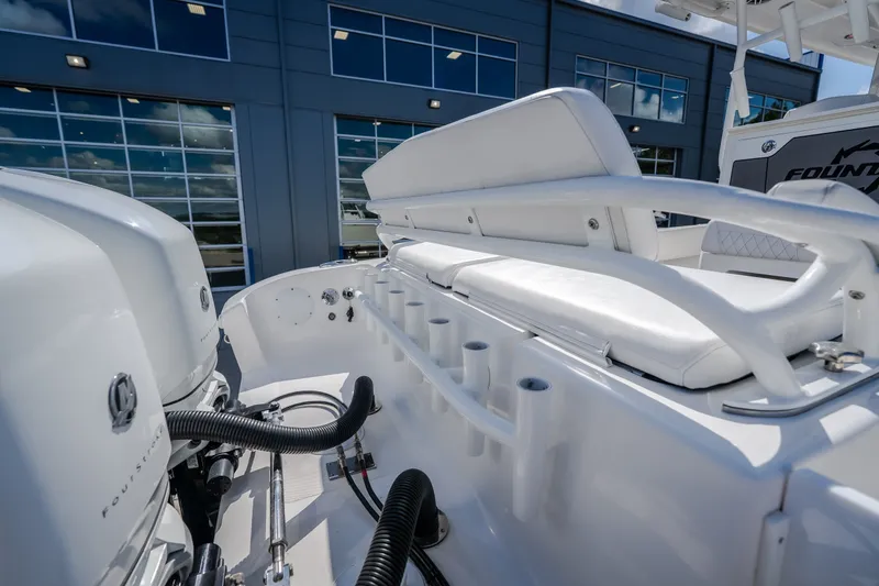 Slide: The Image of 2023 Fountain 34 Tournament Edition boat interior with seating and rod holders. - 81