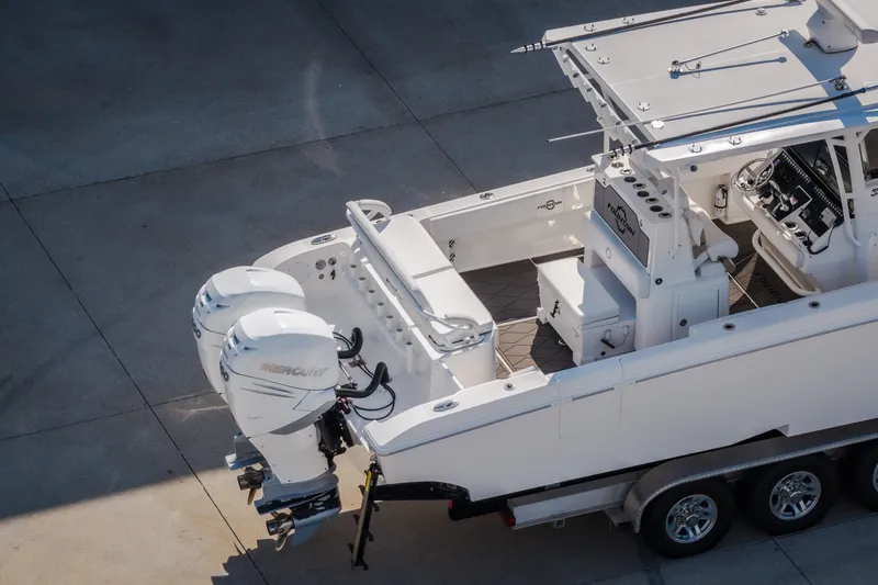Slide: The Image of 2023 Fountain 34 Tournament Edition boat with dual Mercury engines, aerial view. - 22