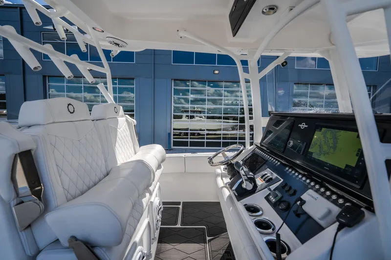 Slide: The Image of 2023 Fountain 34 Tournament Edition boat interior with advanced navigation system and luxurious seating. - 53