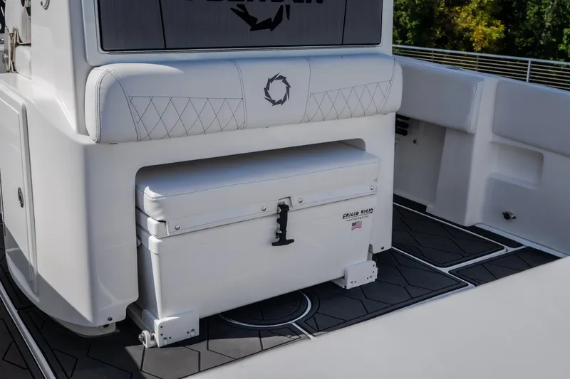 Slide: The Image of 2023 Fountain 34 Tournament Edition boat interior with seating and storage. - 45