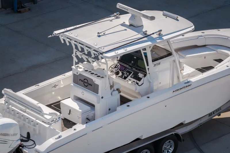 Slide: The Image of 2023 Fountain 34 Tournament Edition boat with advanced navigation and seating features. - 21
