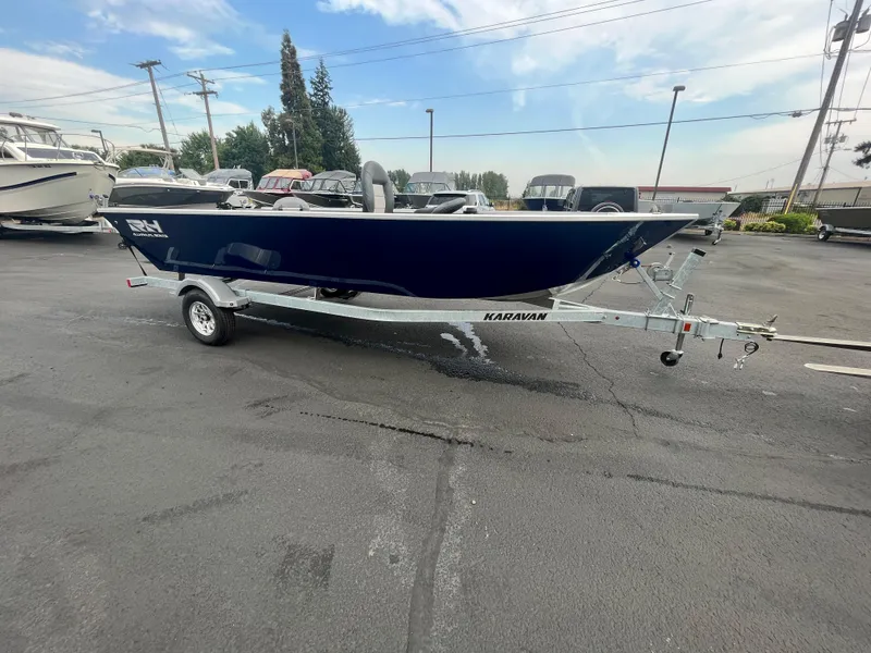 Slide: The Image of 2024 RH Boats Pro V 18 on a trailer in a parking lot. - 10