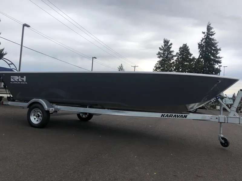 Slide: The Image of 2024 RH Boats Pro V 18 on Karavan trailer, side view. - 12
