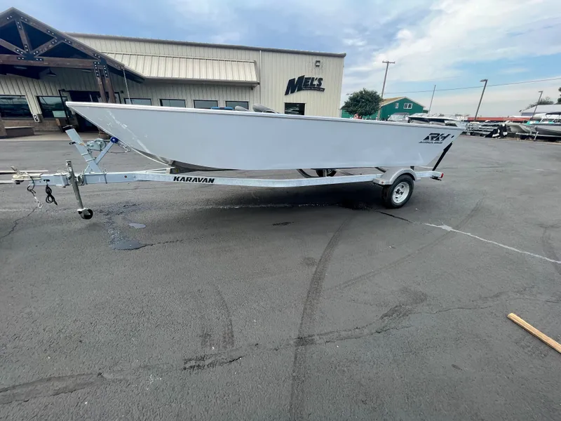 Slide: The Image of 2024 RH Boats Pro V 18 on trailer outside dealership. - 7