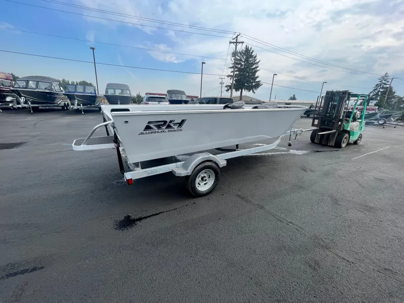 Slide: The Image of 2024 RH Boats Pro V 18 on trailer in parking lot. - 9