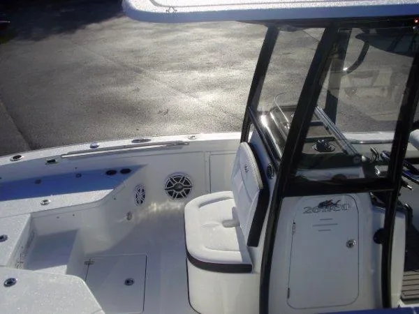 Slide: The Image of 2023 Crevalle 26HCO boat interior with seating and console. - 4