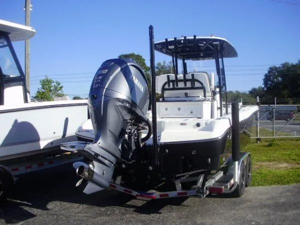Slide: The Image of 2023 Crevalle 26HCO boat with Yamaha outboard motor on trailer. - 9