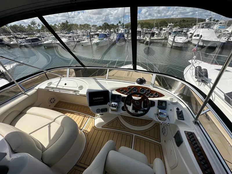 Slide: The Image of 2007 Meridian 391 Sedan yacht helm with marina view. - 19