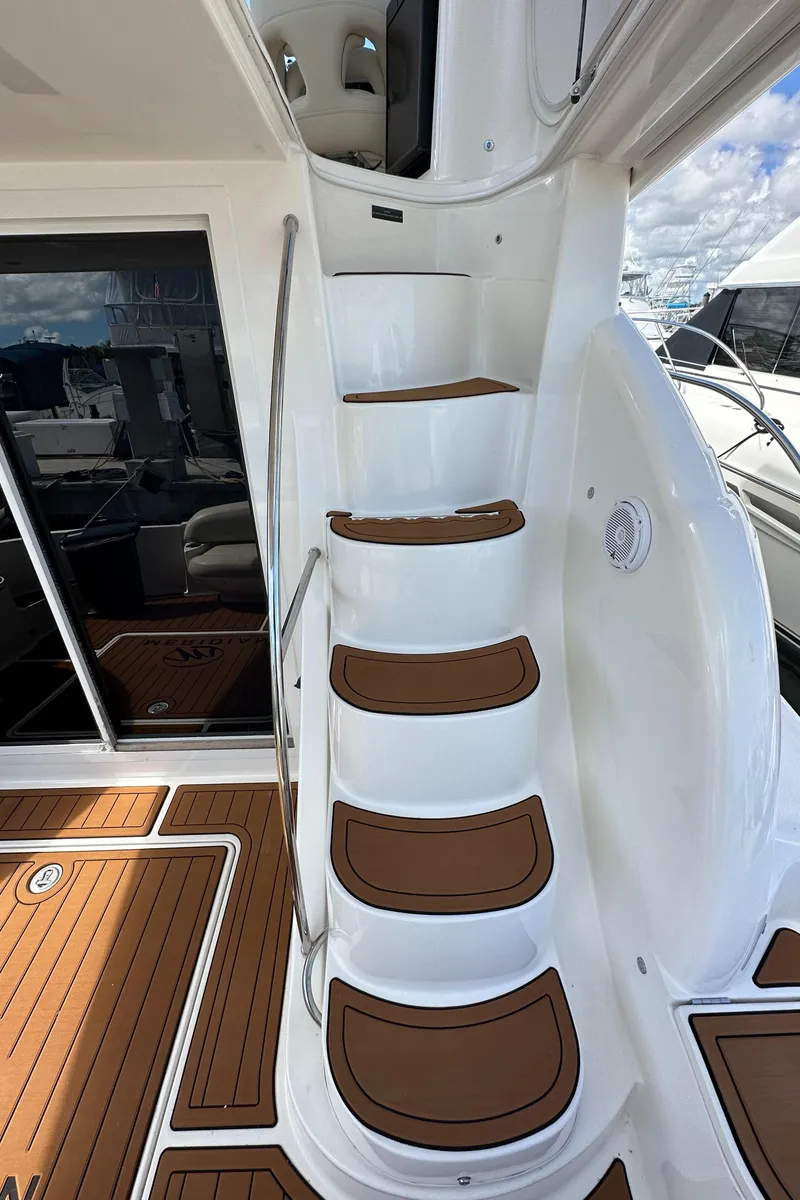 Slide: The Image of 2007 Meridian 391 Sedan yacht with teak steps and modern design. - 31