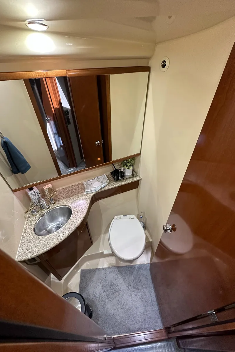 Slide: The Image of 2007 Meridian 391 Sedan bathroom with sink, toilet, and mirror. - 35