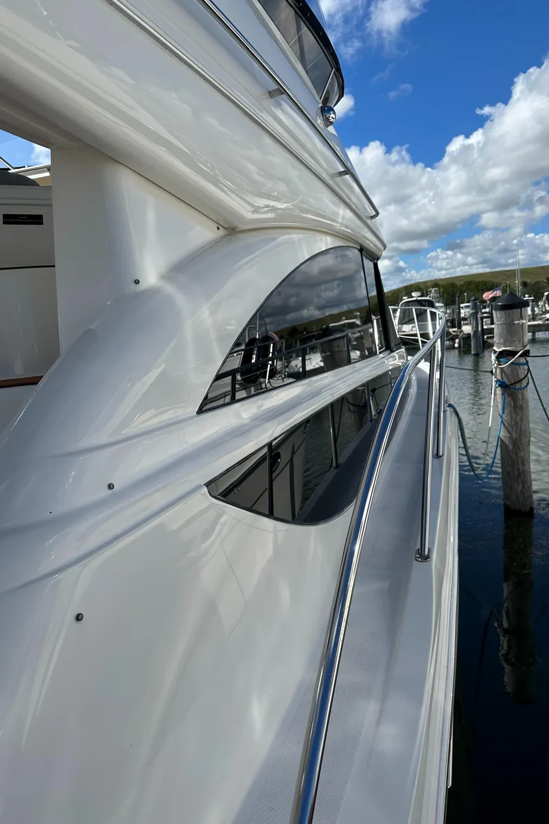 Slide: The Image of Side view of a 2007 Meridian 391 Sedan yacht docked at a marina. - 36