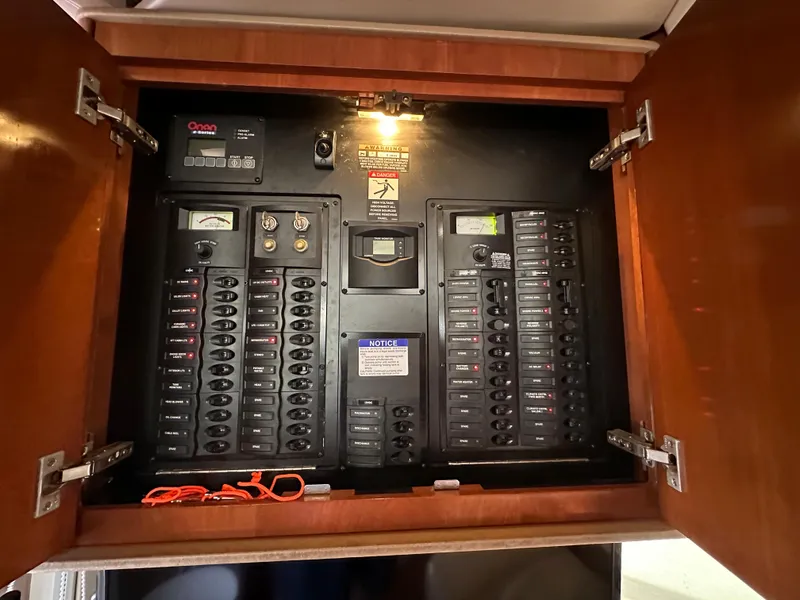 Slide: The Image of Electrical control panel inside a 2007 Meridian 391 Sedan yacht. - 5