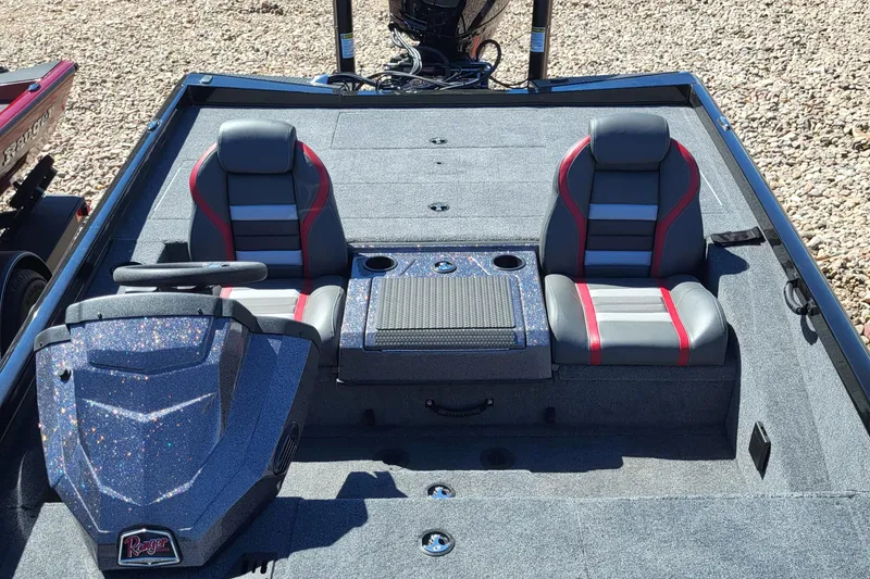 Slide: The Image of 2023 Ranger RT198P boat interior with dual seats and steering console. - 4