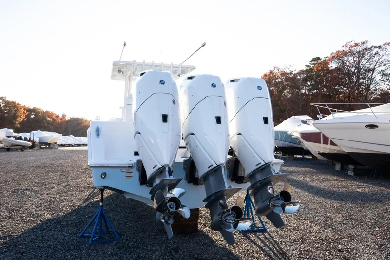 Slide: The Image of 2024 Invincible 39 Open Fisherman with triple outboard engines. - 13