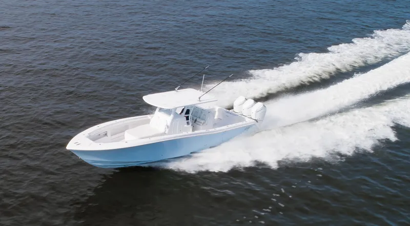 Slide: The Image of 2024 Invincible 39 Open Fisherman boat speeding on open water. - 14