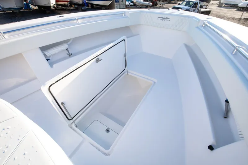Slide: The Image of 2024 Invincible 39 Open Fisherman boat with open storage compartment. - 6