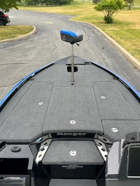 Slide: The Image of 2023 Ranger Z520R fishing boat deck with seating and storage compartments. - 5