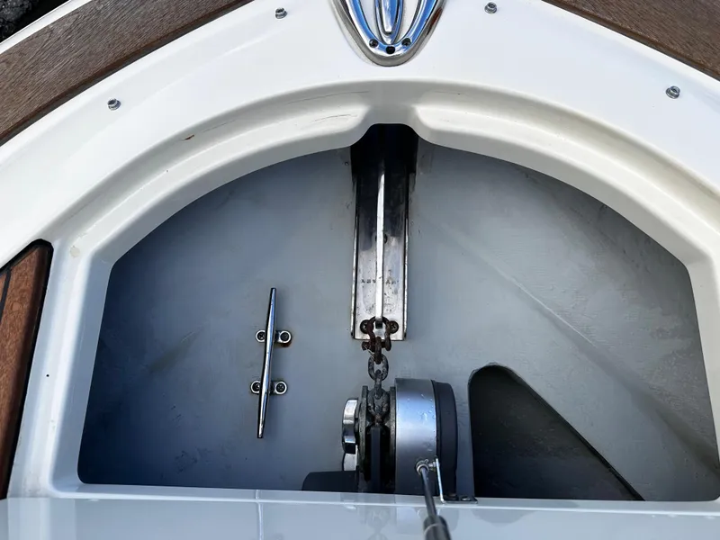 Slide: The Image of 2014 Chris-Craft 28 LAUNCH anchor compartment with winch and chain. - 14