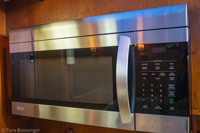 Slide: The Image of Stainless steel microwave in 1986 Chris-Craft Corinthian boat kitchen. - 17