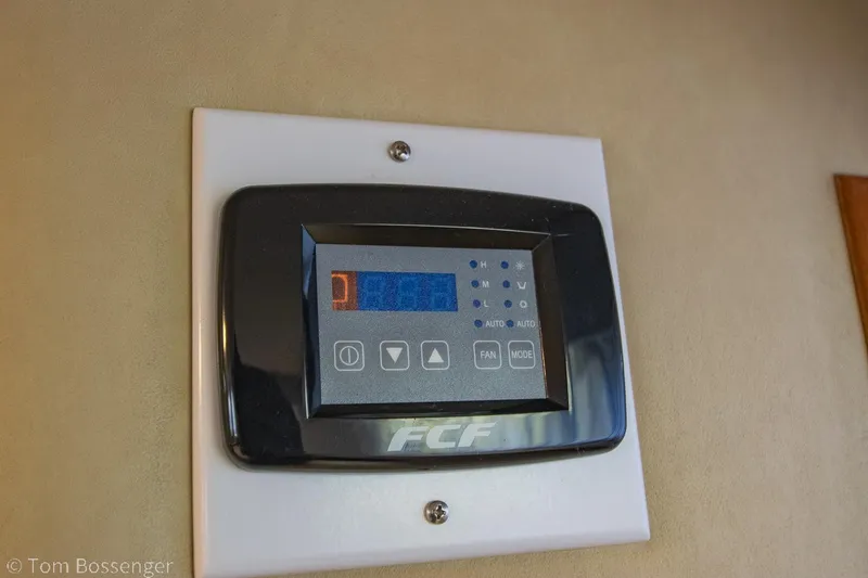 Slide: The Image of Digital control panel on 1986 Chris-Craft Corinthian boat interior wall. - 35